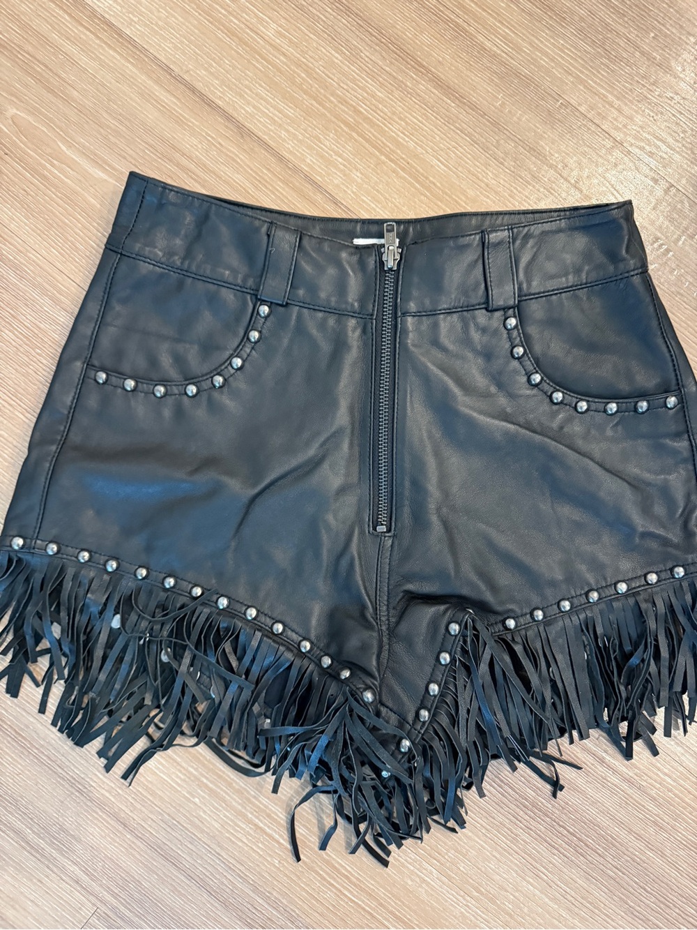Understated LeatherHigh-Waist Black Faux Leather Fringe Shorts with Stud Accents